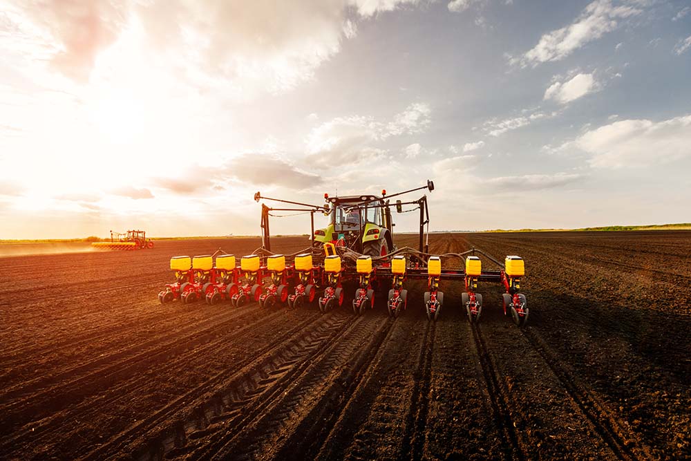 Combine harvester in field -Affiliated Products wire harness customer