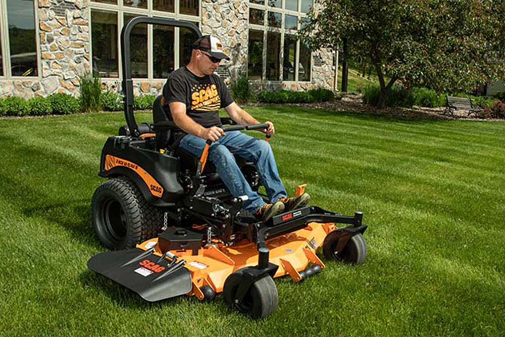 Commercial lawn care technician operating mower — turf care equipment supported by Affiliated Products wire harnesses Commercial lawn care technician operating mower — turf care equipment supported by Affiliated Products wire harnesses